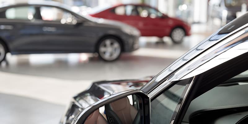 car in a showroom dealership