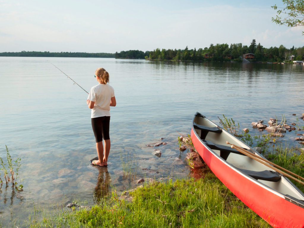 person fishing from the shore