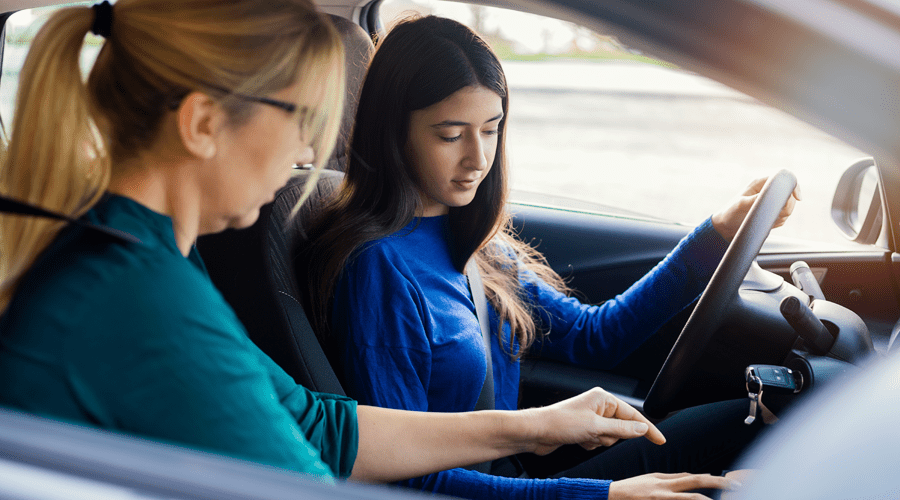 Student driving a car