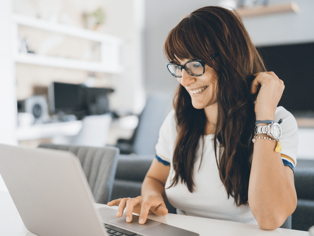 a woman checking online for winnipeg delivery services